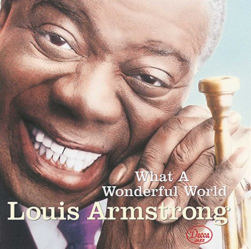 Louis Armstrong smiling, holding a trumpet, album cover for “What a Wonderful World”.