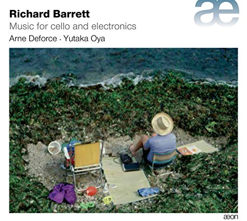 A CD cover featuring a man sitting on a rocky beach, reading.
