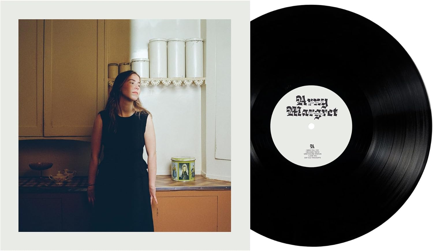 Vinyl record with a portrait of a woman in a dark dress.