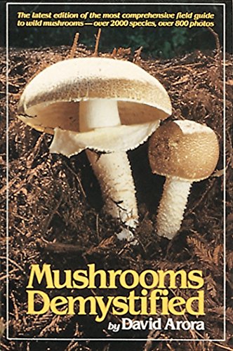 Book cover featuring mushrooms, titled “Mushrooms Demystified” by David Arora.
