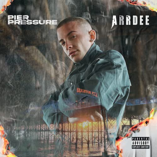 ArrDee album cover featuring the artist superimposed over a pier with burning edges.