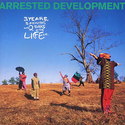 Arrested Development album cover featuring people in a field under a blue sky.
