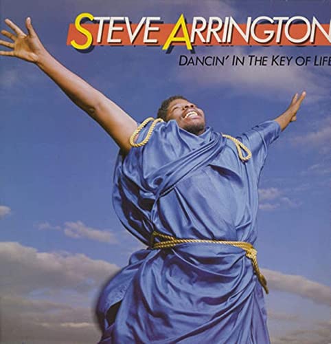 CD cover: Steve Arrington with arms raised against a blue sky.
