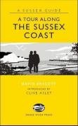 Yellow book cover with coastal scene and title "A Tour Along The Sussex Coast".