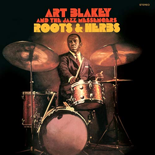 Art Blakey album cover: drummer seated before a drum kit, portrait.