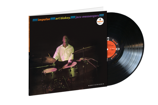 Art Blakey & The Jazz Messengers vinyl record with drummer portrait.