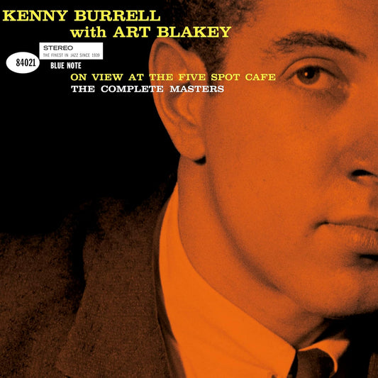 Album cover featuring a close-up portrait of Kenny Burrell in orange tones.