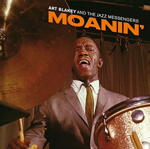 Art Blakey drumming, album cover for “Moanin’” with orange title text.