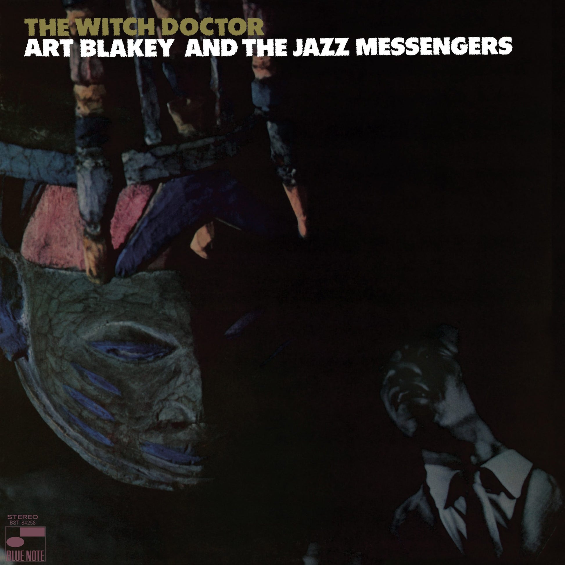 Album cover for Art Blakey’s “The Witch Doctor” featuring a mask and man.