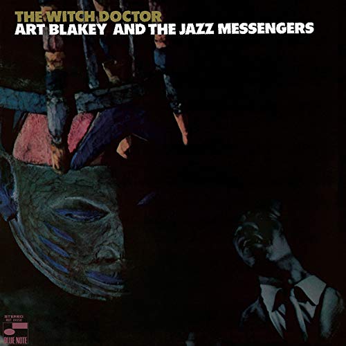 Album cover for Art Blakey’s “The Witch Doctor” featuring a mask and figure.