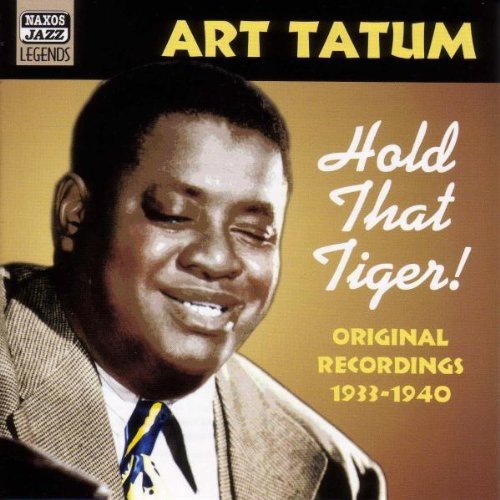 "CD cover with a black and white photo of Art Tatum, smiling, wearing a suit."