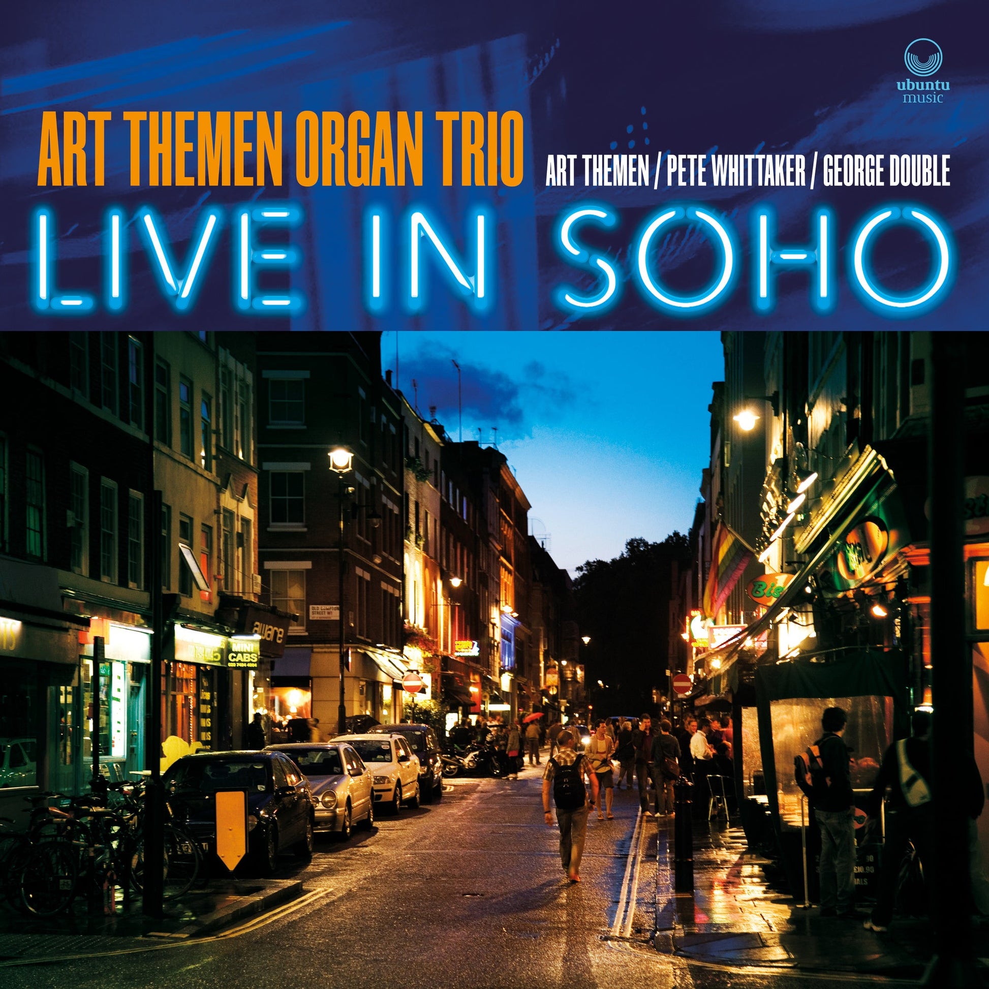 CD cover for Art Themen Organ Trio’s “Live In Soho” with a city street scene.