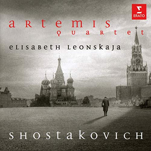 "CD cover with a black-and-white cityscape image and red and white text."