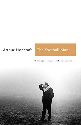 Book cover: man in coat stands on a foggy field, titled "The Football Man".