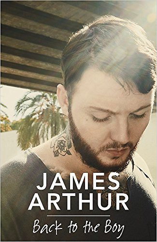 Book cover featuring James Arthur with a floral neck tattoo, looking down.