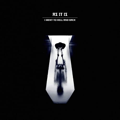 Dark album cover with a figure suspended in a bright, keyhole-shaped light.