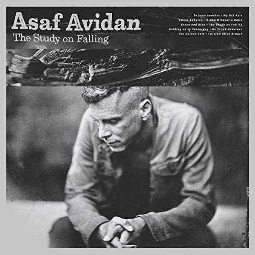 Asaf Avidan album cover: grayscale portrait of a man looking down.