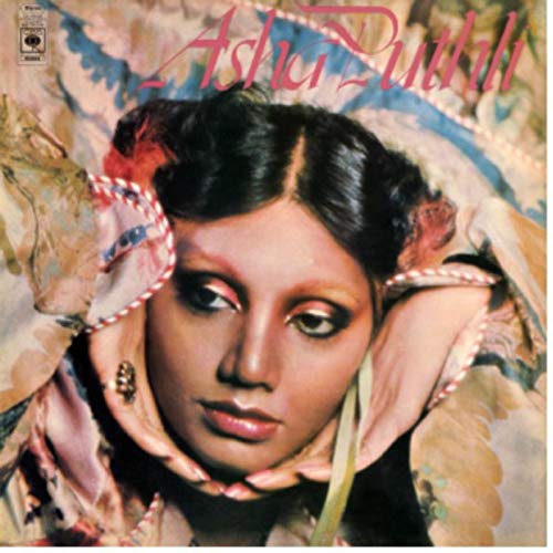 Asha Puthli's album cover featuring a woman's face surrounded by floral fabric.
