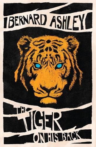 Book cover: orange tiger head with piercing blue eyes, black background.