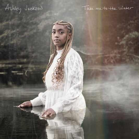 Album cover: Ashley Jackson portrait, waist-deep in misty water.