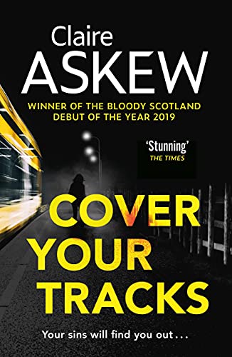 Book cover: dark image of a train, shadowy figure, and bold yellow text.