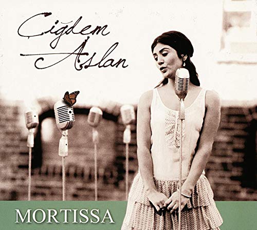 CD cover: Cigdem Aslan portrait with vintage microphones and a butterfly.