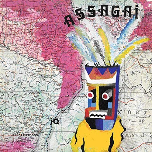 CD cover with colorful, abstract mask art over a map background.