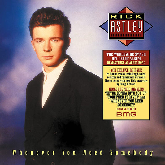 Rick Astley album cover featuring a portrait of the singer in a suit.