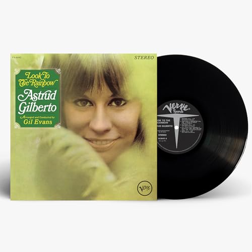 Astrud Gilberto album cover and black vinyl record, side view.