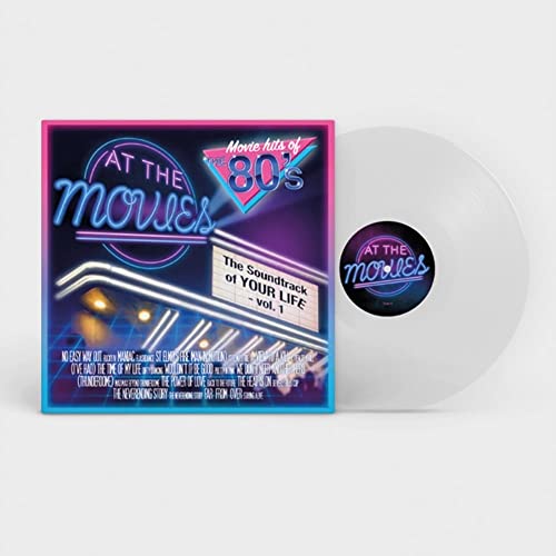 “At The Movies” 80s soundtrack vinyl record with neon-style cover art.