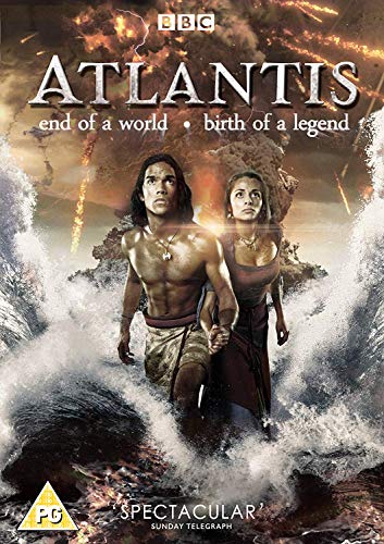 A man and woman stand in crashing waves before a volcanic eruption on DVD cover.