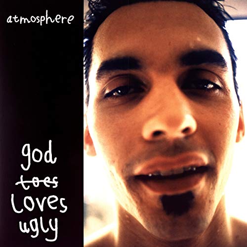 Album cover: close-up portrait of a man with text "God Loves Ugly".