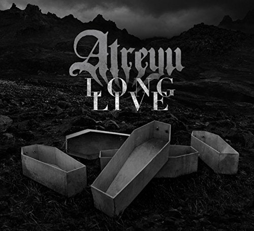 Atreyu album cover, "Long Live," featuring coffins in a rocky landscape.