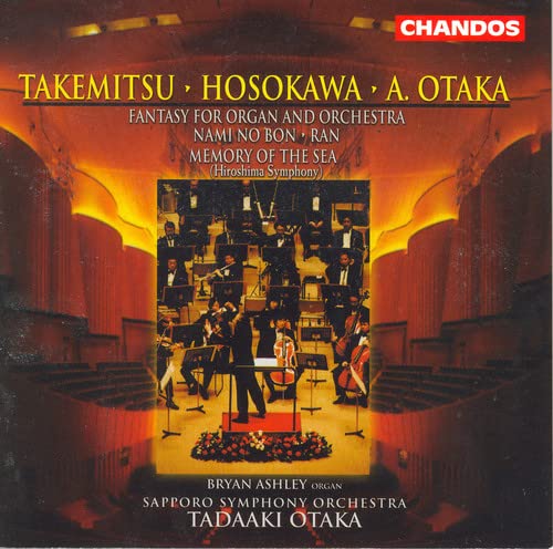 CD cover featuring an orchestra performing on a grand stage.