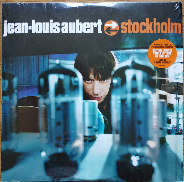 Vinyl record cover for Jean-Louis Aubert’s “Stockholm” album, featuring a portrait.
