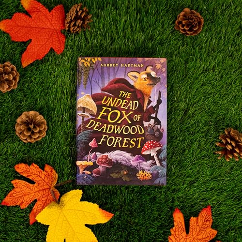 Book cover featuring a fox with a red hood in a forest setting.