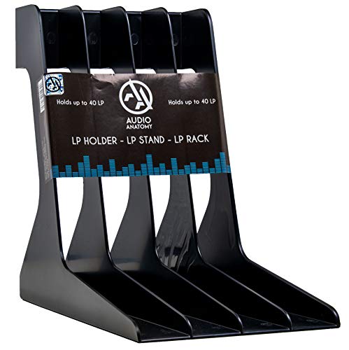 Black plastic LP record stand holding vinyl albums, with packaging label.