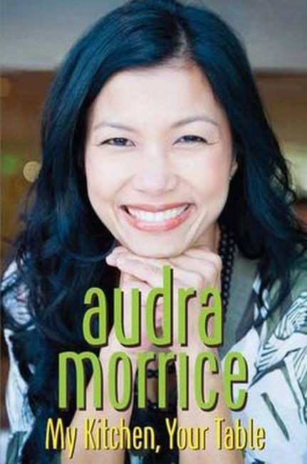 Book cover featuring a smiling woman and the title "My Kitchen, Your Table".