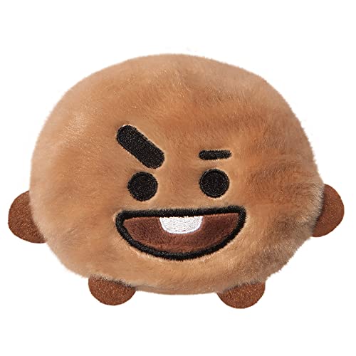 Brown, round, plush Shooky character with a wide grin and one visible tooth.