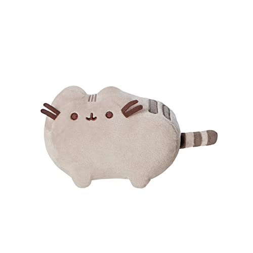 Grey, plump Pusheen cat plush toy with striped tail, side view.