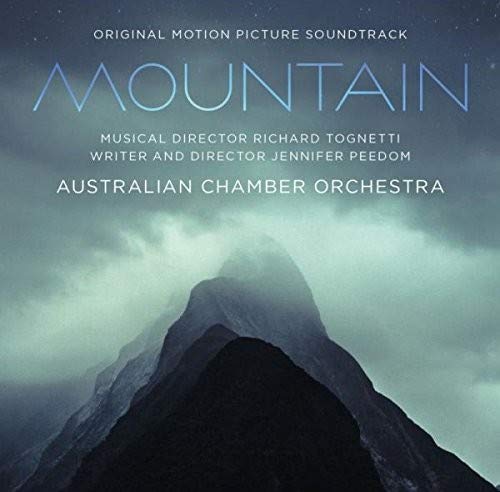 CD cover featuring a dark, misty mountain peak under a starry sky with text.