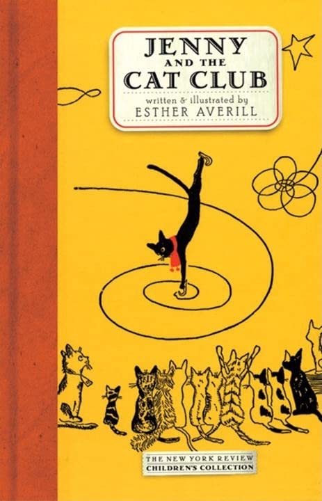 Yellow book cover with black cat skating and a crowd of cats below.