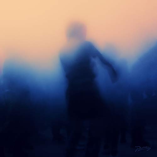 Blurred figure against a gradient of orange and blue light.