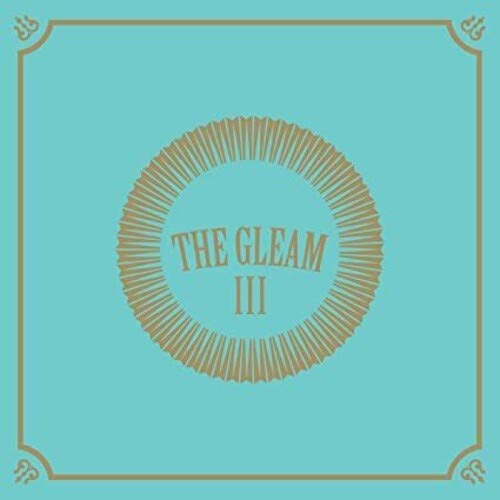 Avett Brothers album cover, turquoise background, gold circular design, text "THE GLEAM III".