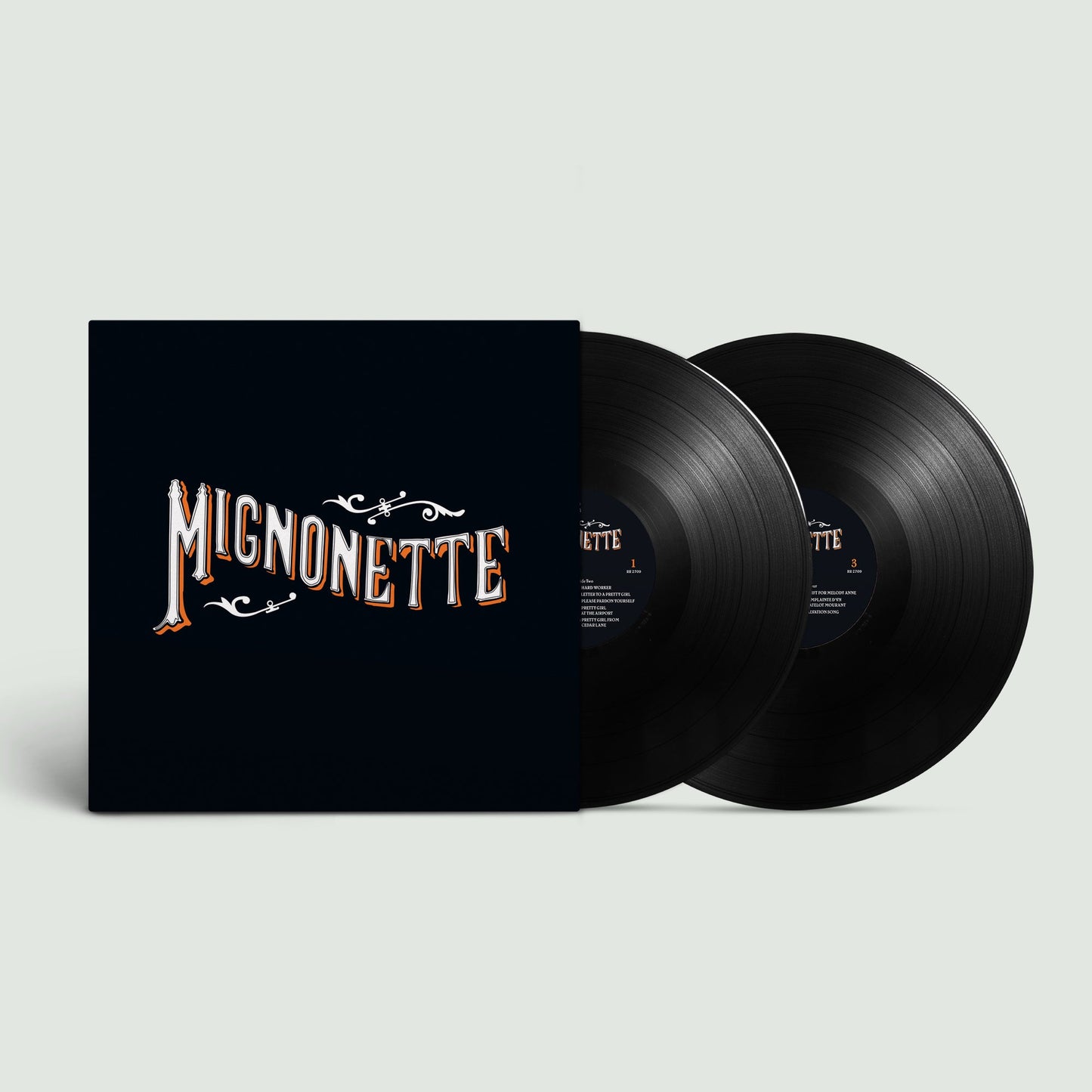 Avett Brothers' "Mignonette" vinyl record with ornate gold lettering.
