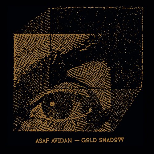 Gold textured album cover with abstract face and text below.