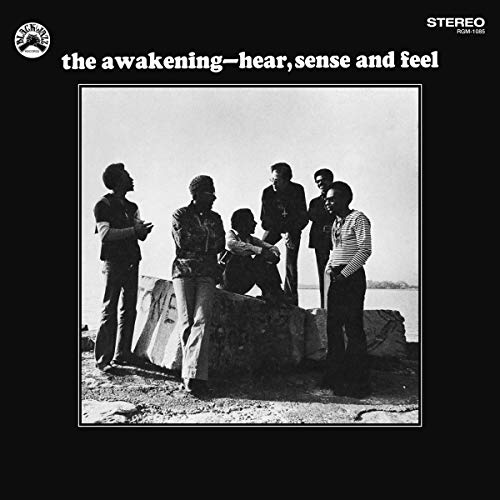 Black and white album cover featuring a group of five men outdoors.