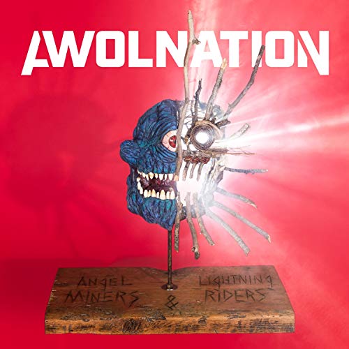 Album cover with a blue, robotic head on a wooden base against a red background.