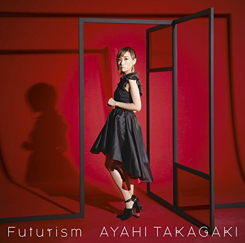 A woman in a black dress stands before a black frame on red background.
