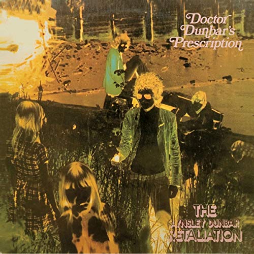 Album cover showing people in a grassy field with a warm, golden-toned filter.